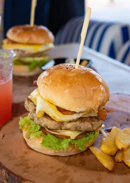 image of a massive burger waiting to be destroyed by a happy guest of samui luxury boats