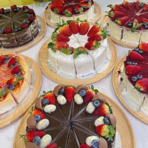 several different cake with fruits