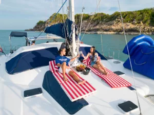 image showing couple enjoying drinks and refreshments on our slider catamaran 43 luxury charter on koh samui, thailand