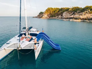 image of our slider catamaran 43 luxury charter on koh samui, thailand moored with the slide in action