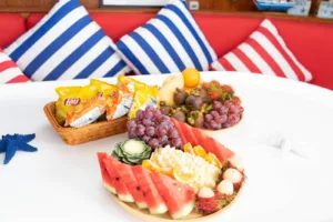 snacks and fruit ready to eat on our slider catamaran 43 luxury charter on koh samui, thailand