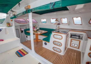 image showing galley and dining area on a family friendly slider catamaran charter koh samui thailand